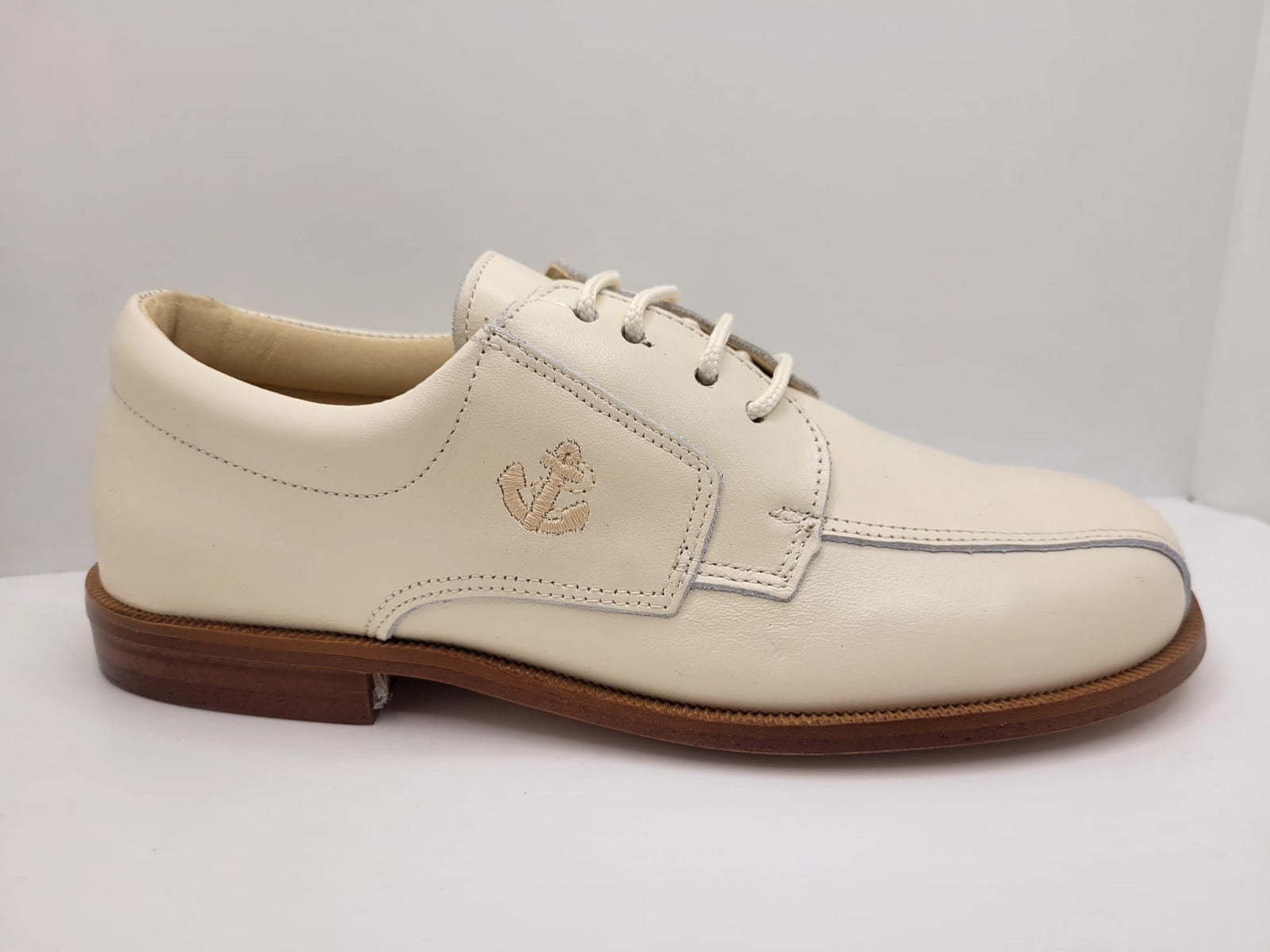 Zapato crema cordón